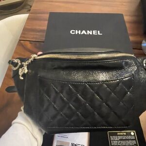 Authentic Chanel Black glazed Calf-skin leather  quilted waist/crossbody bag.
